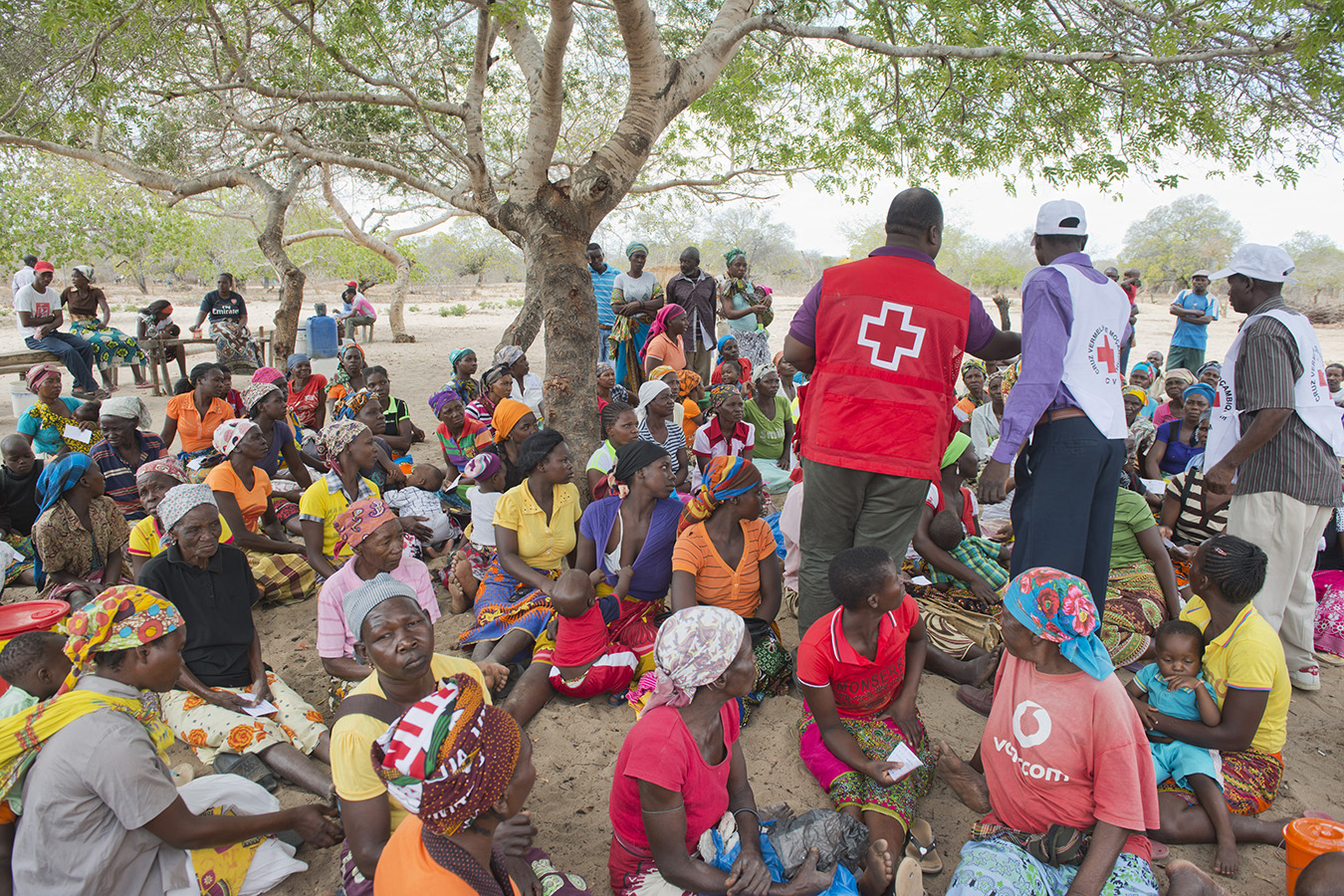 Women in the Funhalouro district of Imhambane province in Mozambique await a food distribution by the Mozambican Red Cross. In 2016 Mozambique experienced its worst drought for three decades, leaving large sections of the population facing food insecurity.