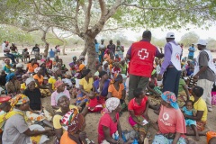 Women in the Funhalouro district of Imhambane province in Mozambique await a food distribution by the Mozambican Red Cross. In 2016 Mozambique experienced its worst drought for three decades, leaving large sections of the population facing food insecurity.